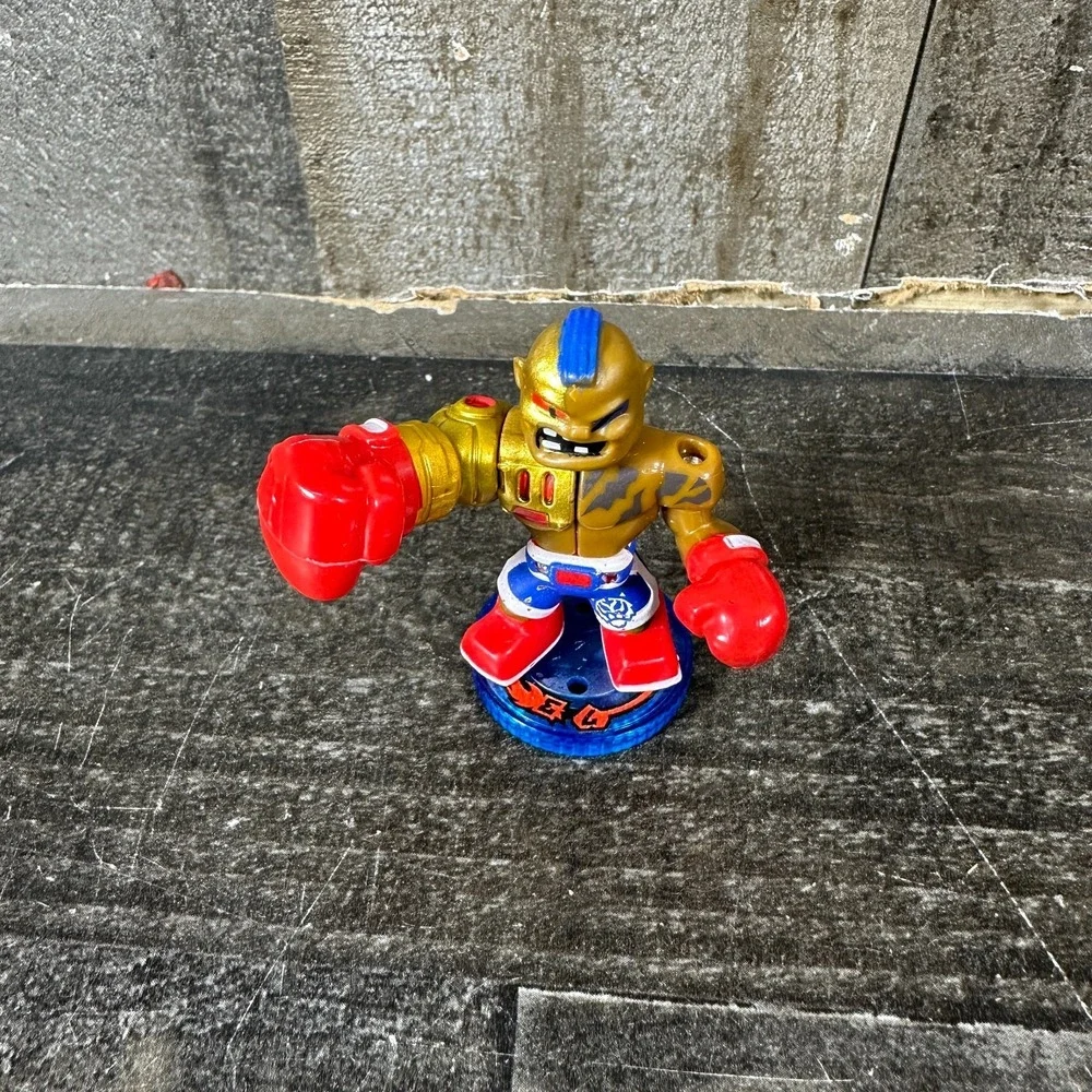 Akedo Ultimate Arcade Warriors Series 1 Buster Bling Action Figure